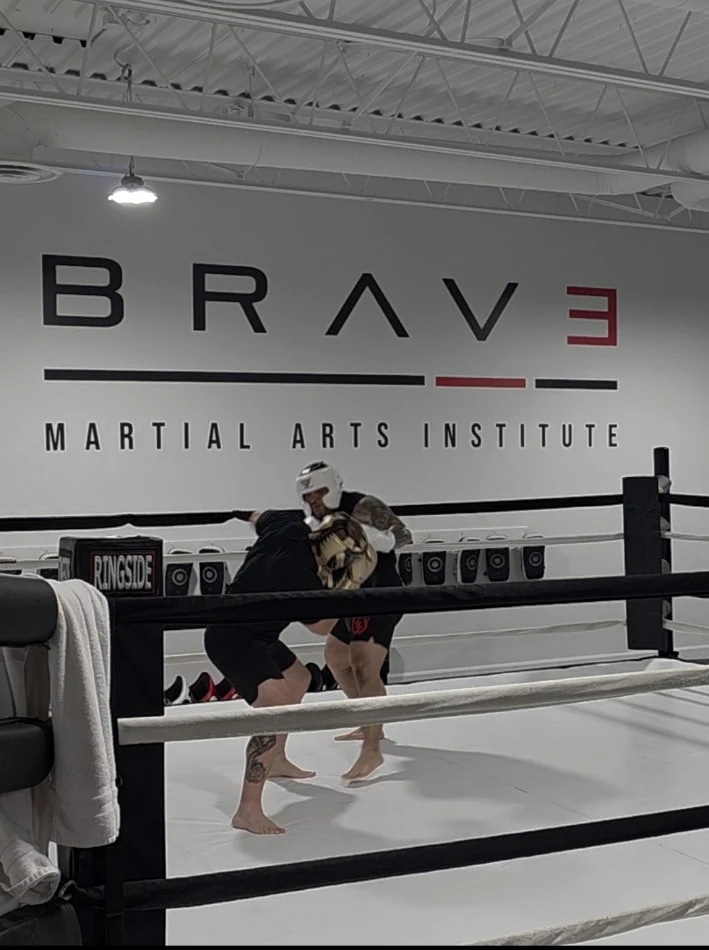Close-range boxing work in the ring