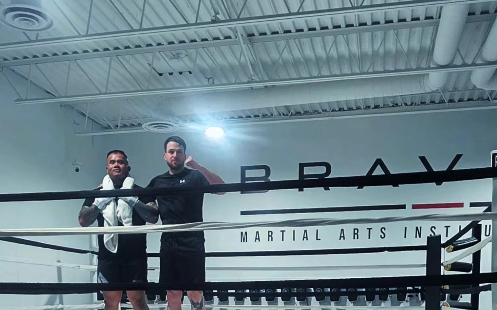 Coach Tony and a client after a boxing training session