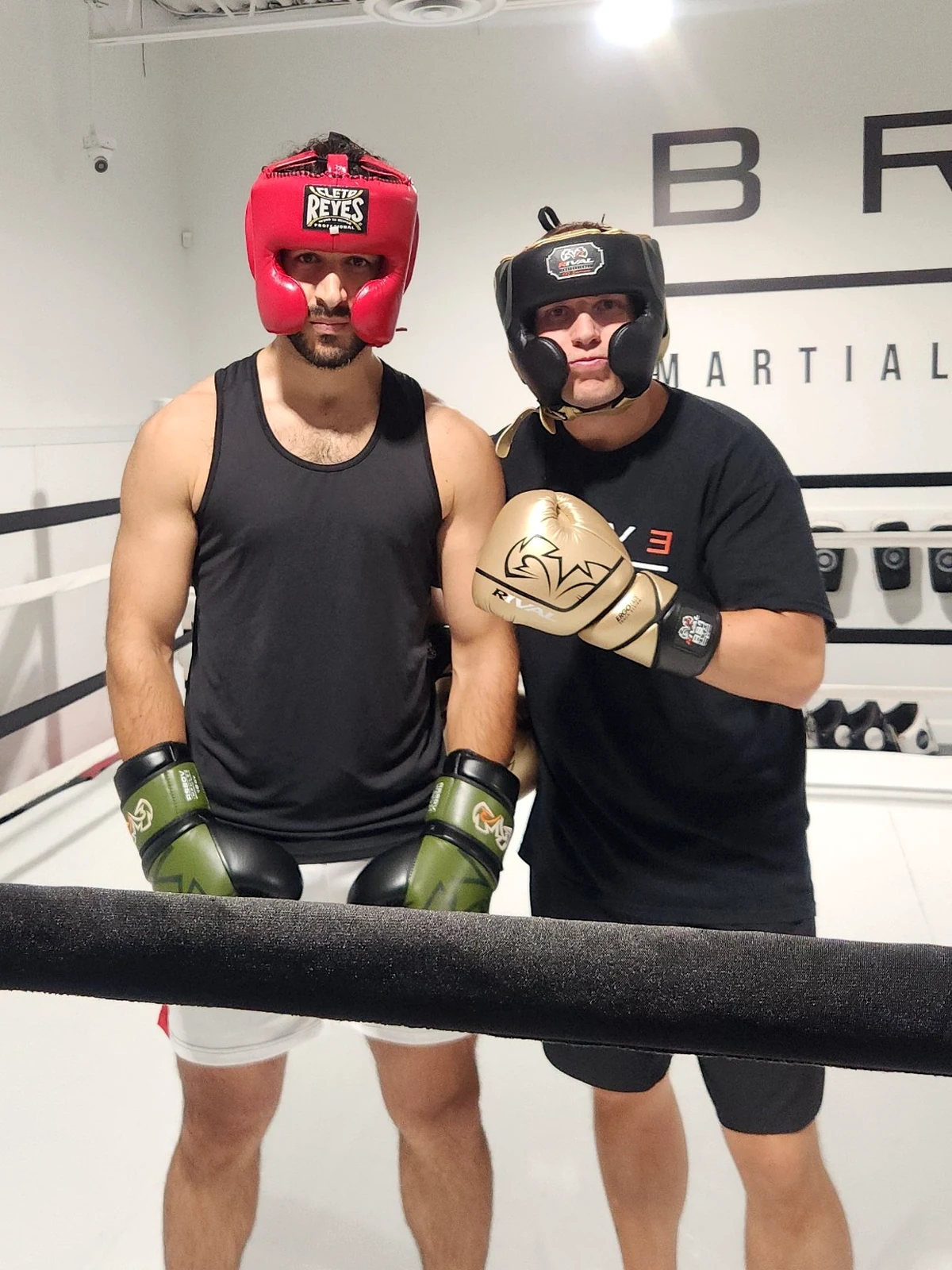 Coach Tony with a boxing client in the ring
